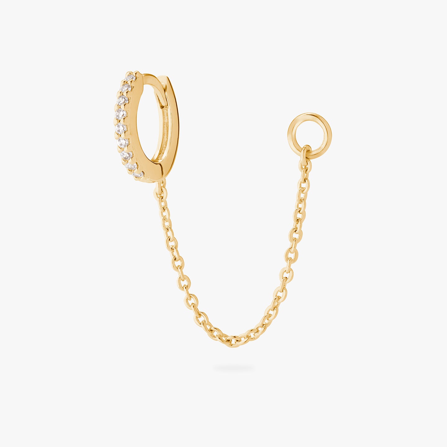 An image of a gold/clear mini pave huggie with a connector chain to an open 4mm wide jump ring. color:null|gold/clear