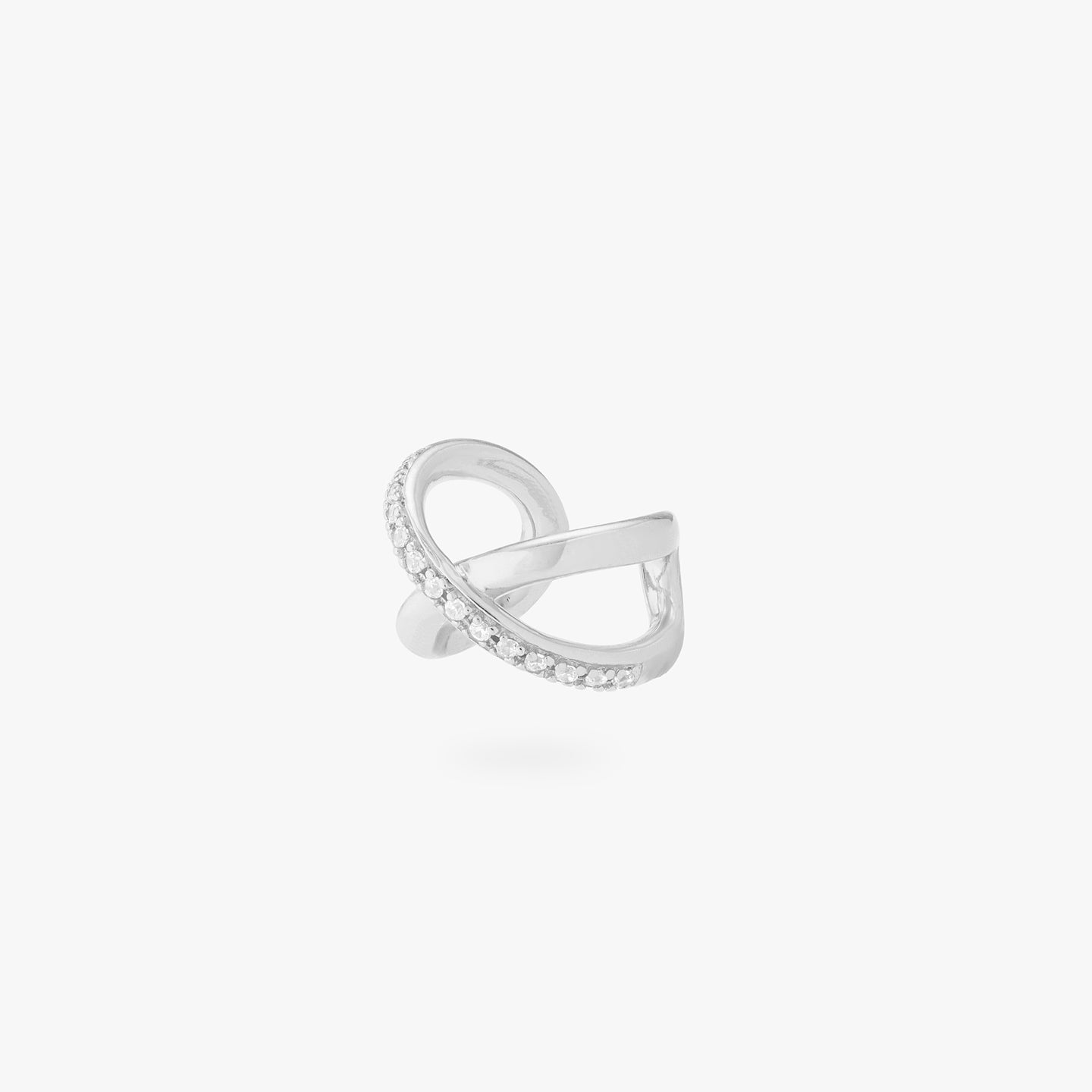 This is an image of a silver twist cuff that has one side of the twist diagonally lined with silver/clear CZs. color:null|silver/clear