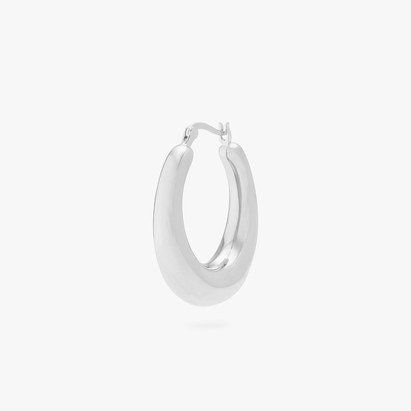 This is a silver, medium-sized, oval crescent shaped hoop. color:null|silver