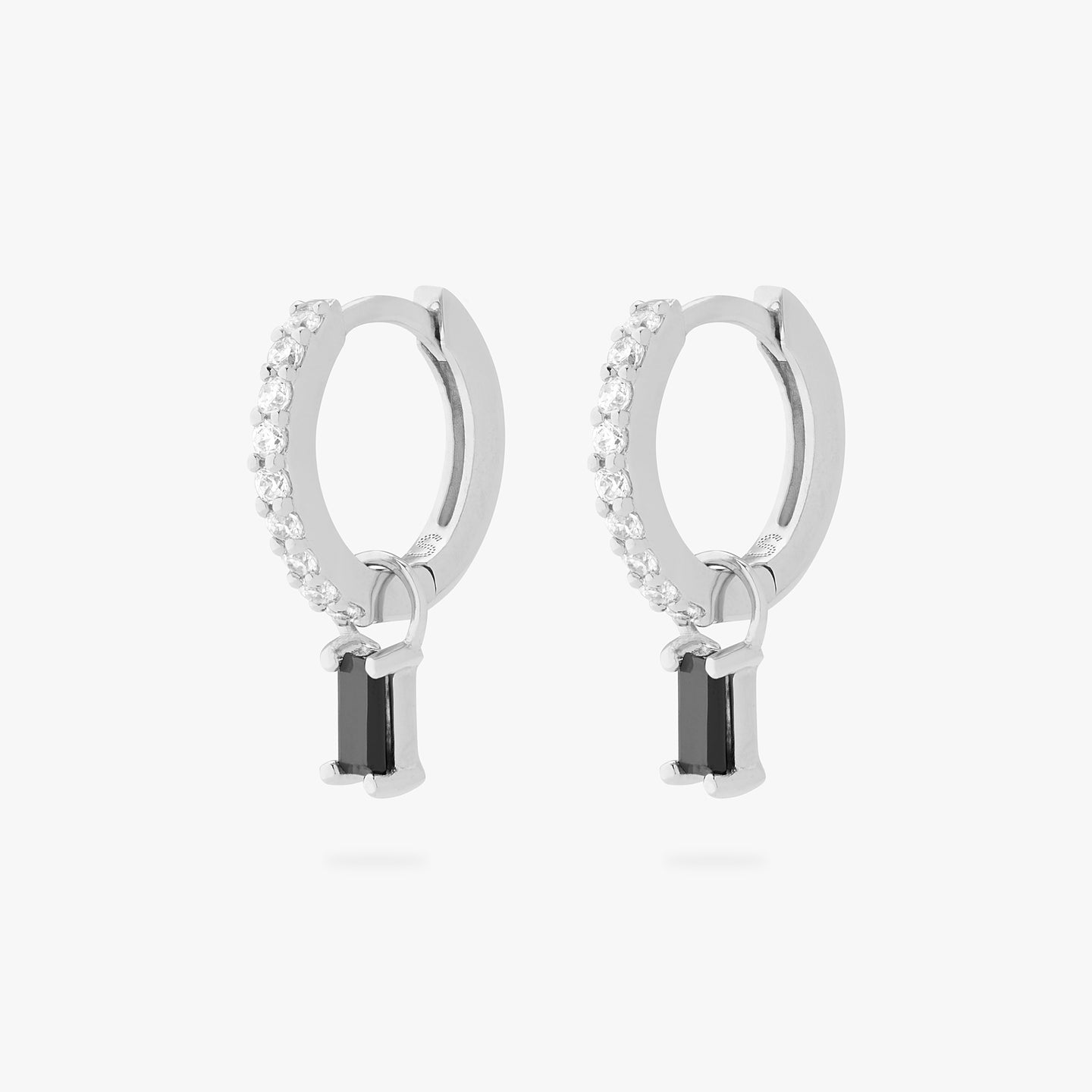 a pair silver/clear mini pave huggies with black baguette stone charms [pair] color:null|silver/black