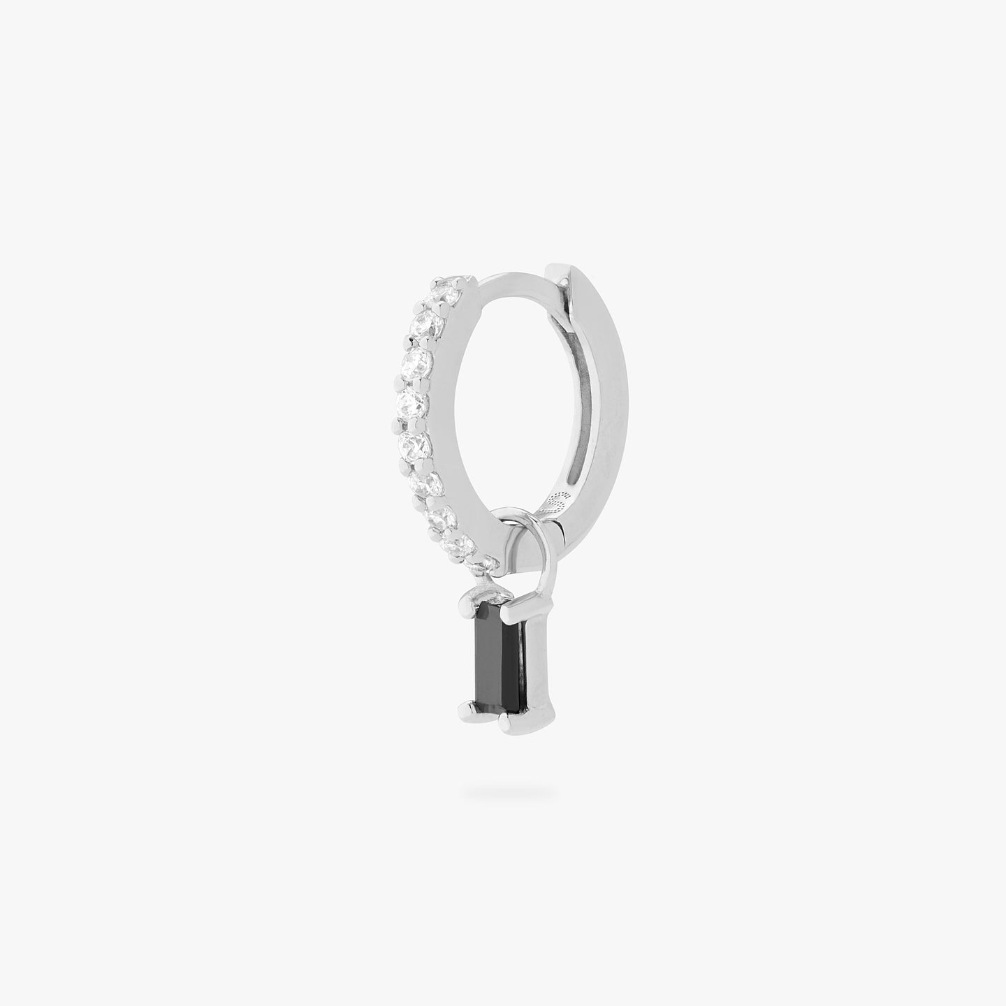 a silver/clear mini pave huggie with a black baguette stone charm color:null|silver/black