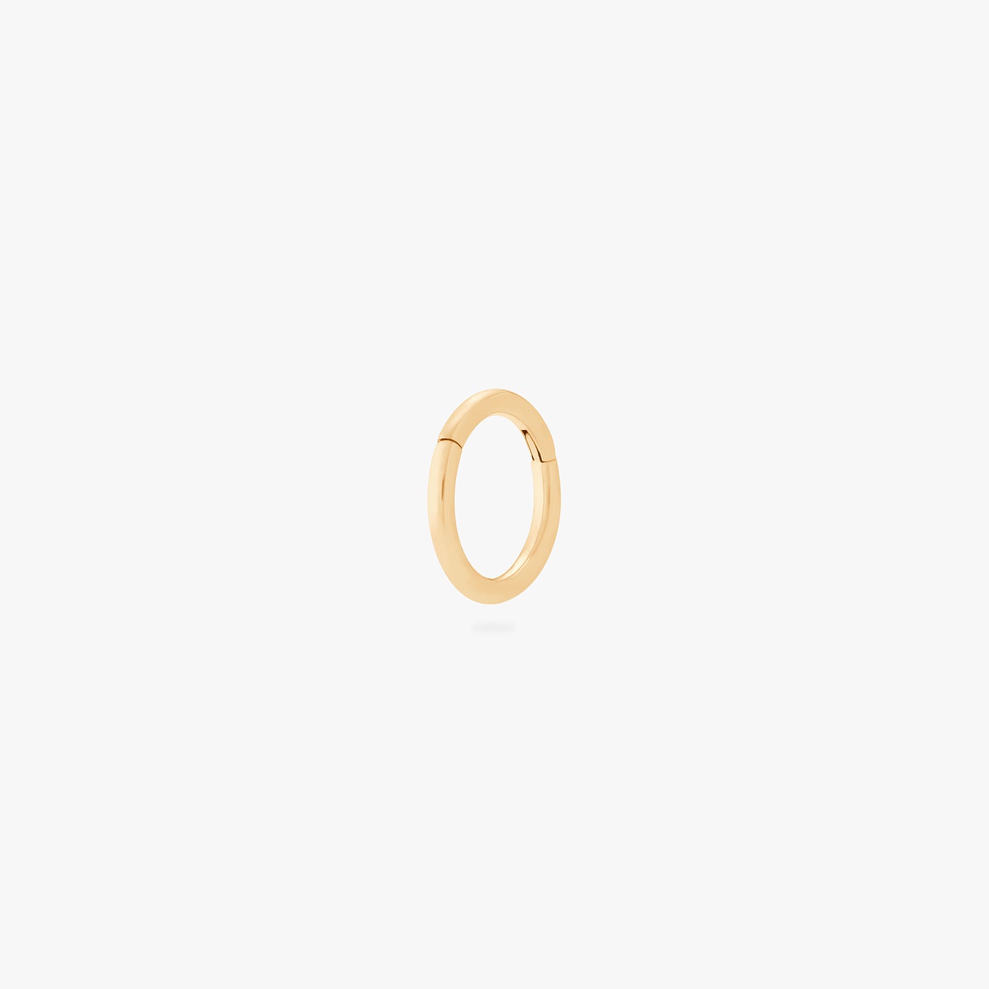 This is an image of a gold clicker with a 6mm inner diameter. color:null|gold