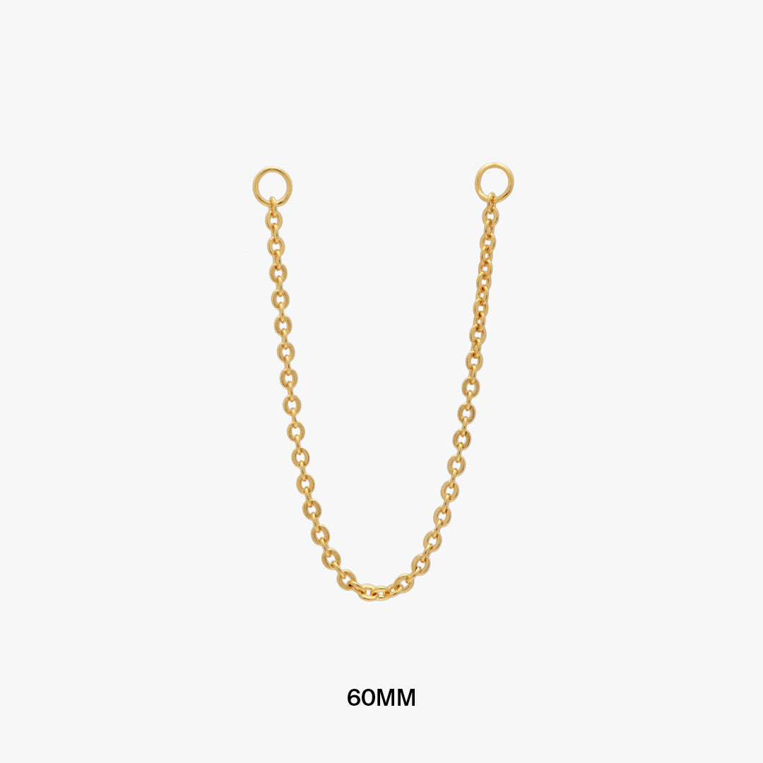 This is a thin gold chain that can be used to connect two earrings and measures 60mm color:null|60mm|60mm / gold