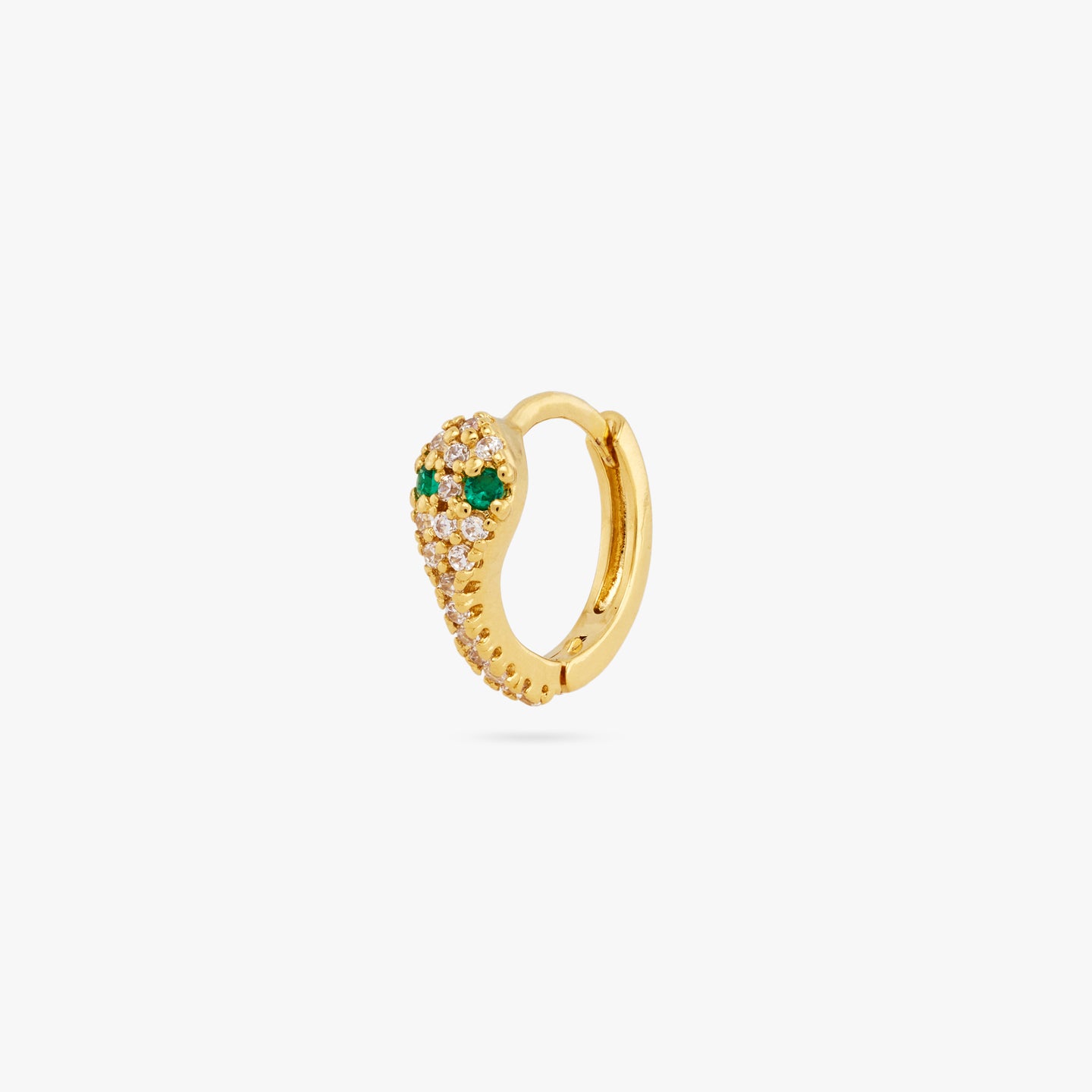 This is a gold, pave lined and serpent shaped huggie earring with green CZ eyes color:null|gold/clear