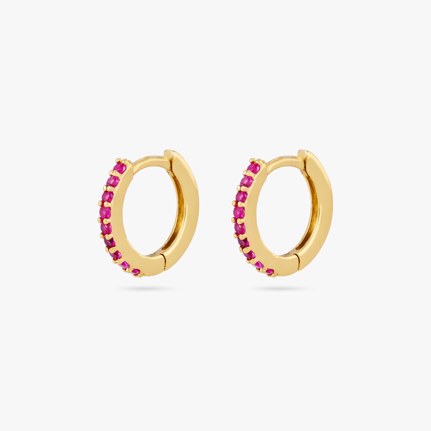 A pair of mini gold huggies lined with pink cz gems on the front [pair] color:null|gold/pink