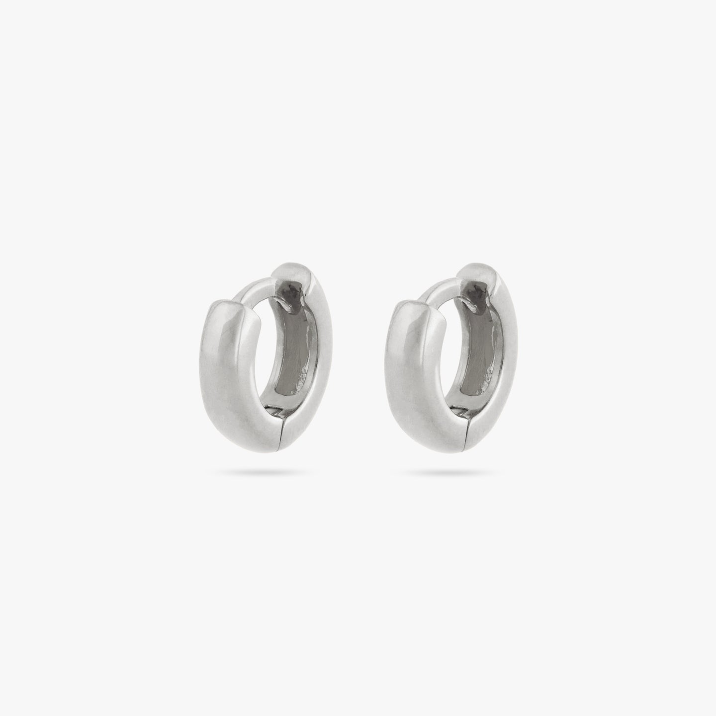 A pair of micro sized chunky silver huggies [pair] color:null|silver