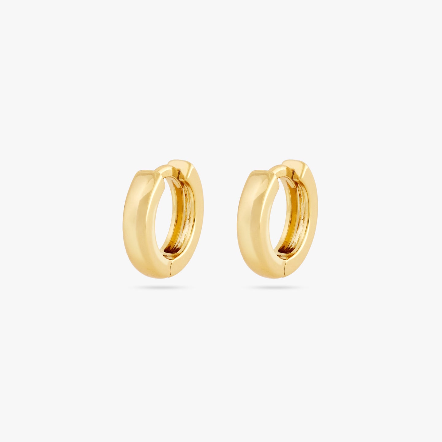 Pair of mini sized chunky gold huggies. [pair] color:null|gold