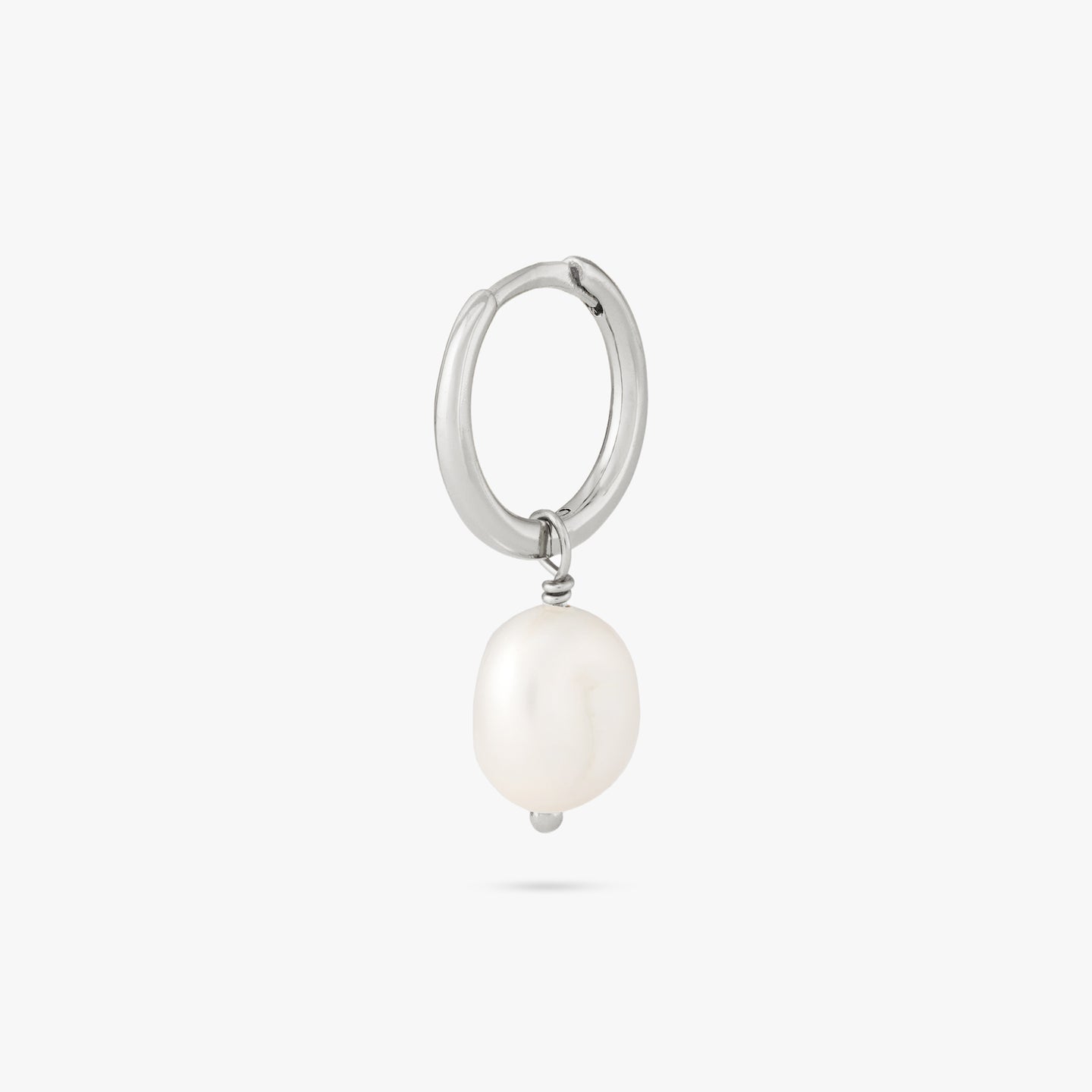 Dangling Baroque Pearl Huggie color:null|silver