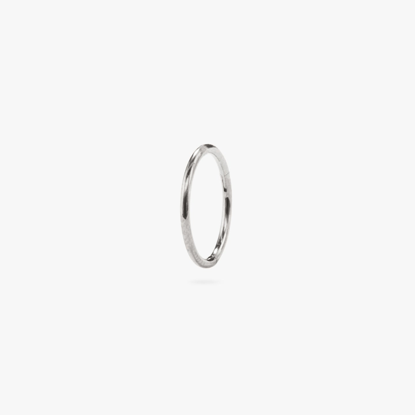 This is a clicker earring color:null|silver