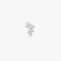 This image shows the front view of a 14k yellow gold pear cluster flatback with three clear cz stones 
