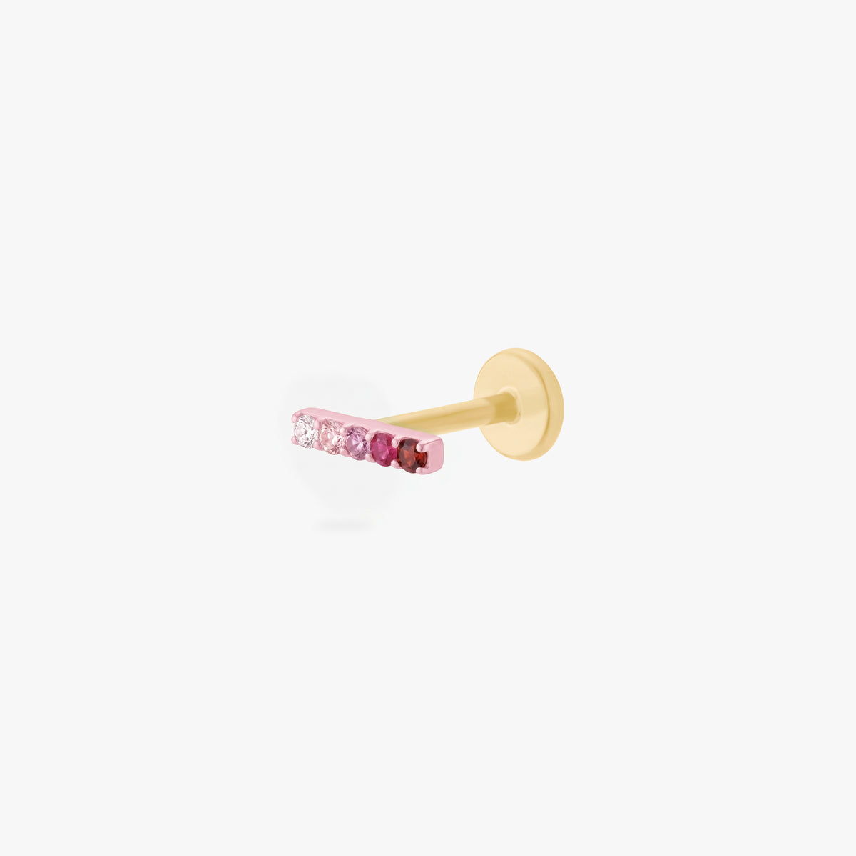 This is an image of an anodized pink flatback stud with a gradient of 5 pink CZ stones creating a pave bar. The flatback post for this earring is gold toned.