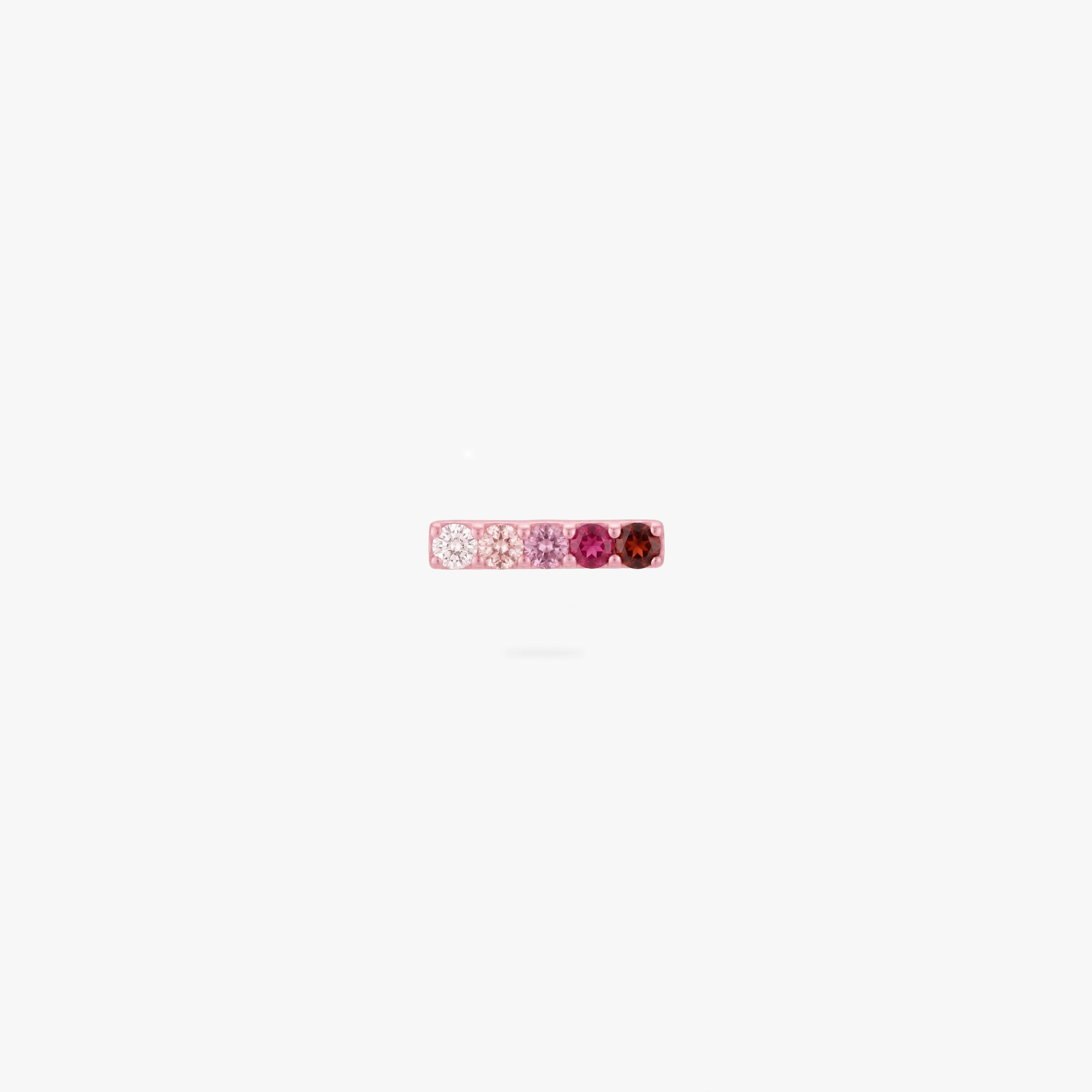 This image is an anodized pink titanium flatback stud that features 5 CZ stones in a gradient bar from a crystal CZ to pink and red CZs against a white background.