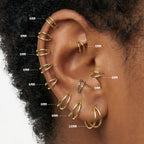 On ear image with all gold double clicker sizes highlighting sizes 5mm to 10mm