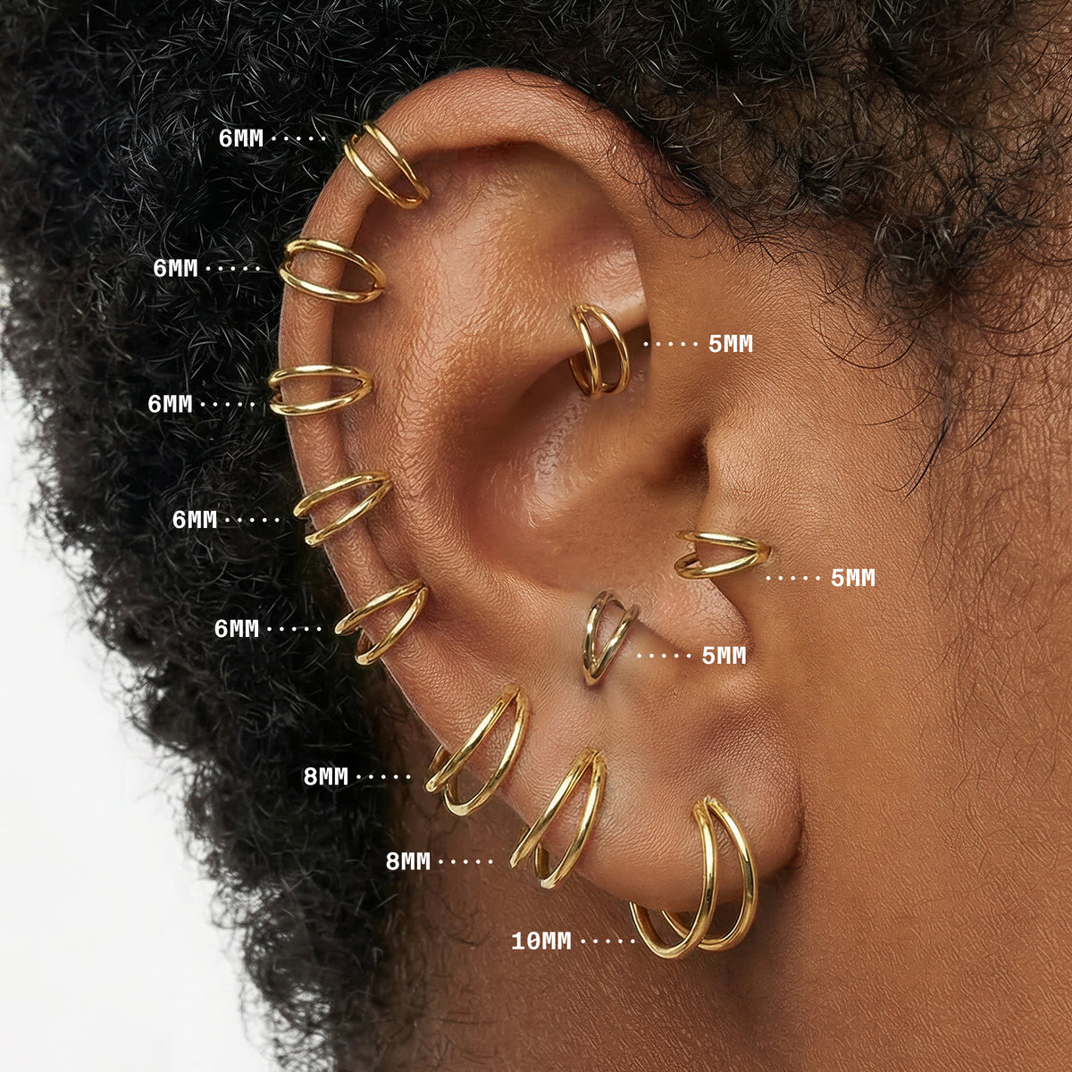 On ear image with all gold double clicker sizes highlighting sizes 5mm to 10mm
