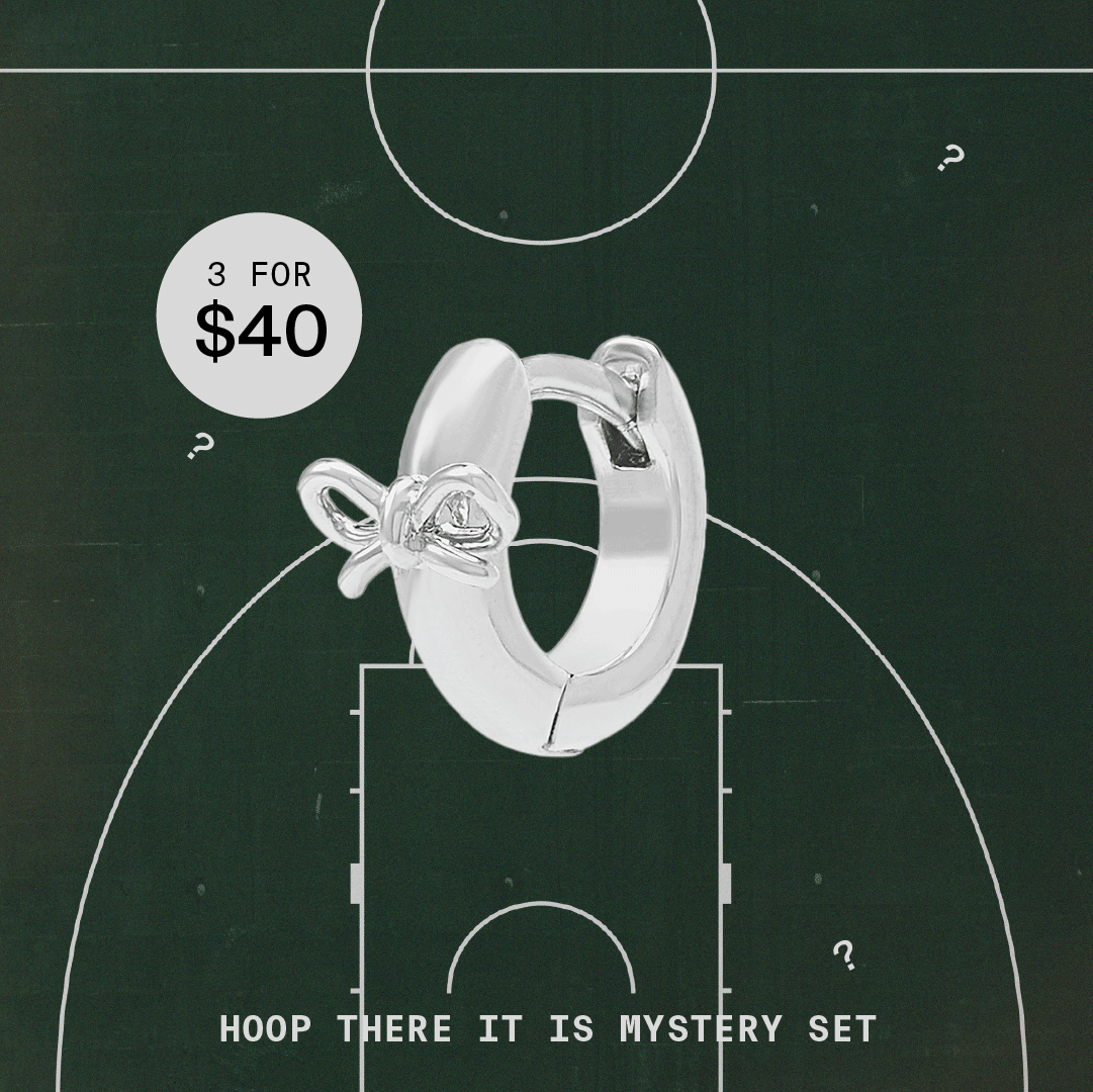 Hoop There it is Mystery Set featuring 3 silver huggies for $40. Image shows an assortment of silver huggies over a basketball court. 