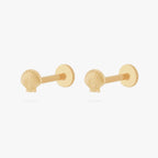 This image shows the front view of a pair of 14k gold shell flat back earrings