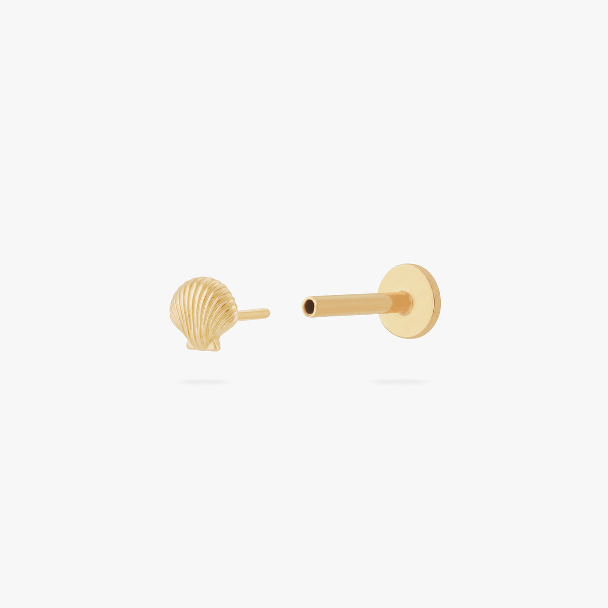 This image shows the front open view of a 14k gold shell flat back earring 