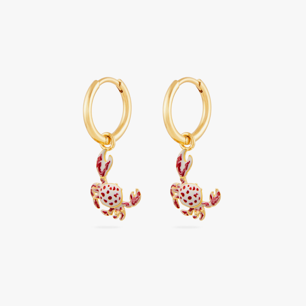  This image shows a pair of 14k gold plated huggies with crab charms with red spots. 