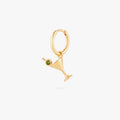 this image shows a 14k gold plated huggie with a martini glass charm with a green gemstone.