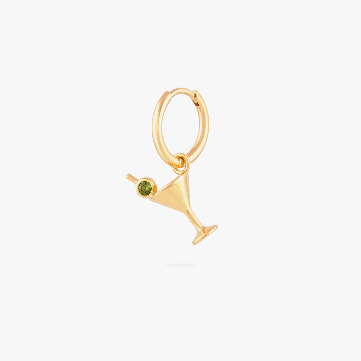 this image shows a 14k gold plated huggie with a martini glass charm with a green gemstone.