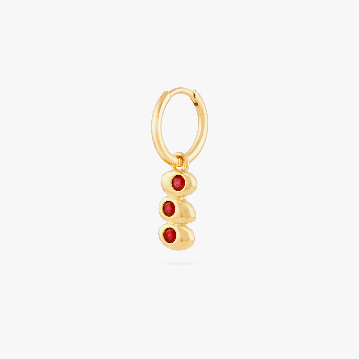 this image shows a 14k gold plated huggie with three olives with a red stone in the middle of each olive. 