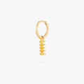 this image shows a 14k gold plated huggie with a twisted pasta charm. 