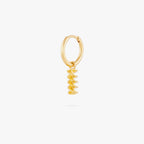 this image shows a 14k gold plated huggie with a twisted pasta charm. 