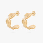This image shows the front view of a pair of 14k gold plated hoops with spirals along the front 