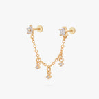This is an anodized gold titanium chained flatback stud with two flatback posts. Each flatback stud is a clear star CZ, and there is a chain with three clear CZ stones that connect the two earrings.