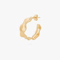 This image shows the front view of a 14k gold plated hoop with an organic shape around the hoop 