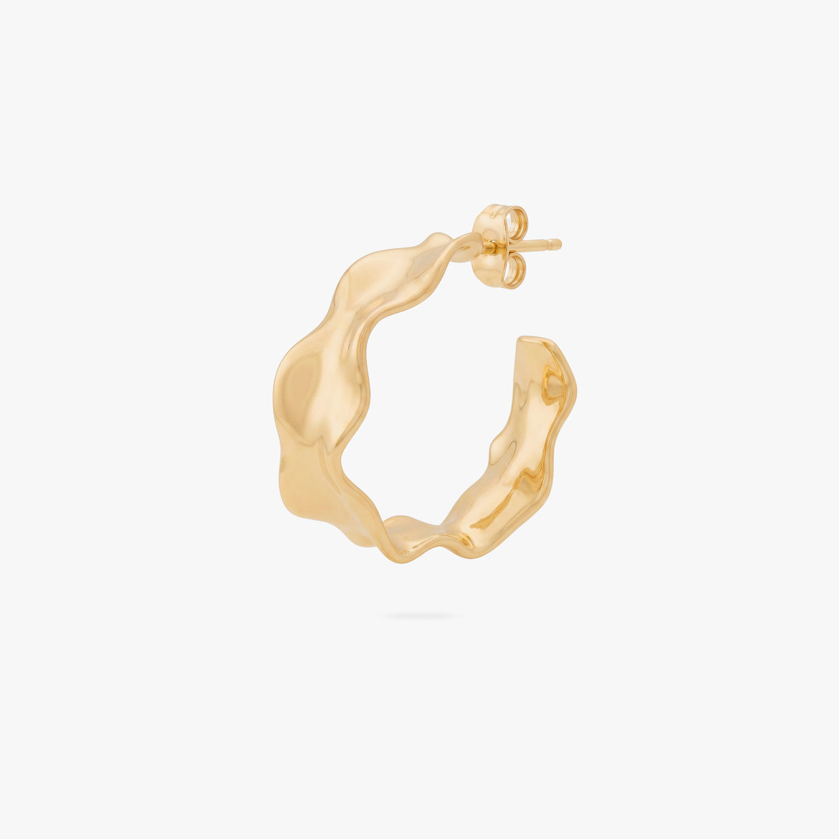 This image shows the front view of a 14k gold plated hoop with an organic shape around the hoop 