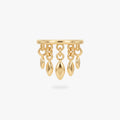 This image shows a titanium 14k gold plated clicker with 5 solid fringe dangles 