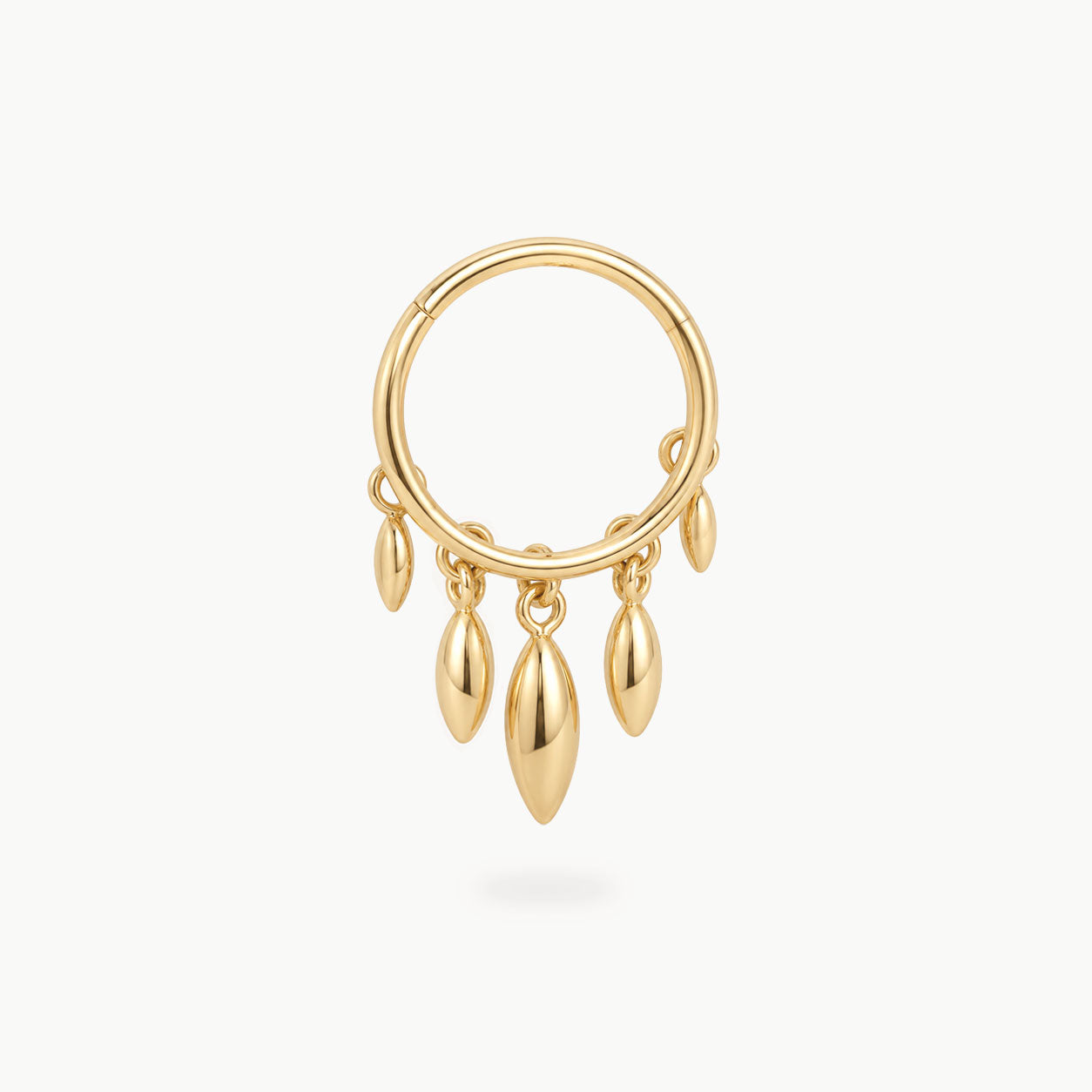 This image shows a titanium 14k gold plated clicker with 5 solid fringe dangles