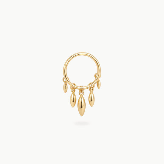 This image shows a titanium 14k gold plated clicker with 5 solid fringe dangles 