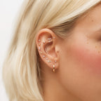 Gold earscape featuring 14k yellow gold micro flatbacks up the ear. 