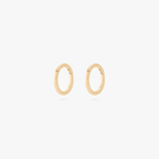 Pair of gold 5mm clickers on a white background