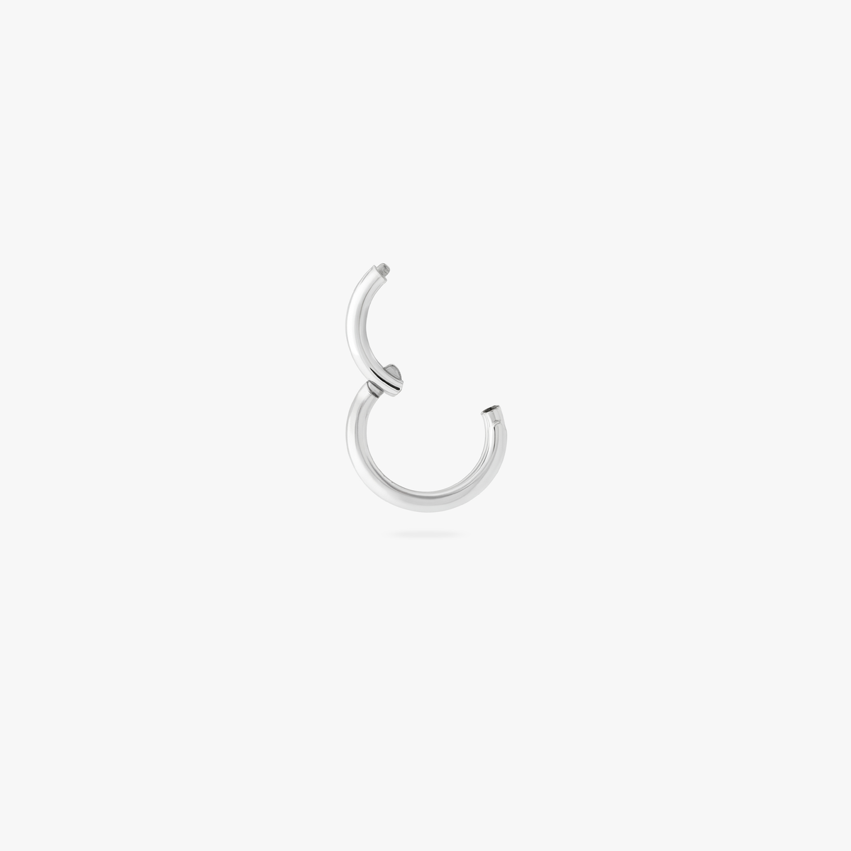 Open 5mm silver double clicker on a white bakground