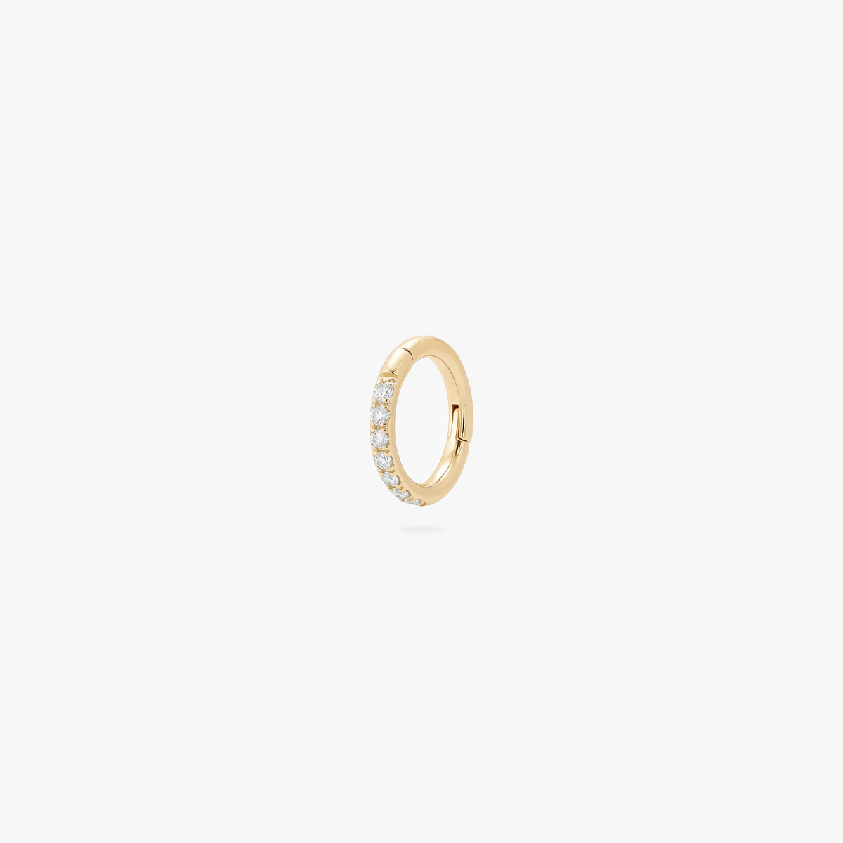 5mm gold pave clicker on a white background