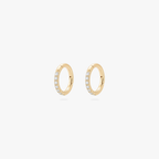 Pair of 5mm gold pave clickers on a white background
