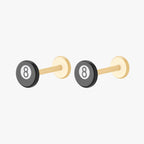 this image shows the side view of a pair of the golden titanium 8 ball flatback. the outer circle of the flatback is black with the inner circle white