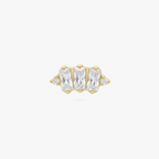 This is an image of a gold toned flatback stud which displays three clear, baguette cut CZ stones in a crown shape with two round, clear CZ stones on both ends of the crown. 
