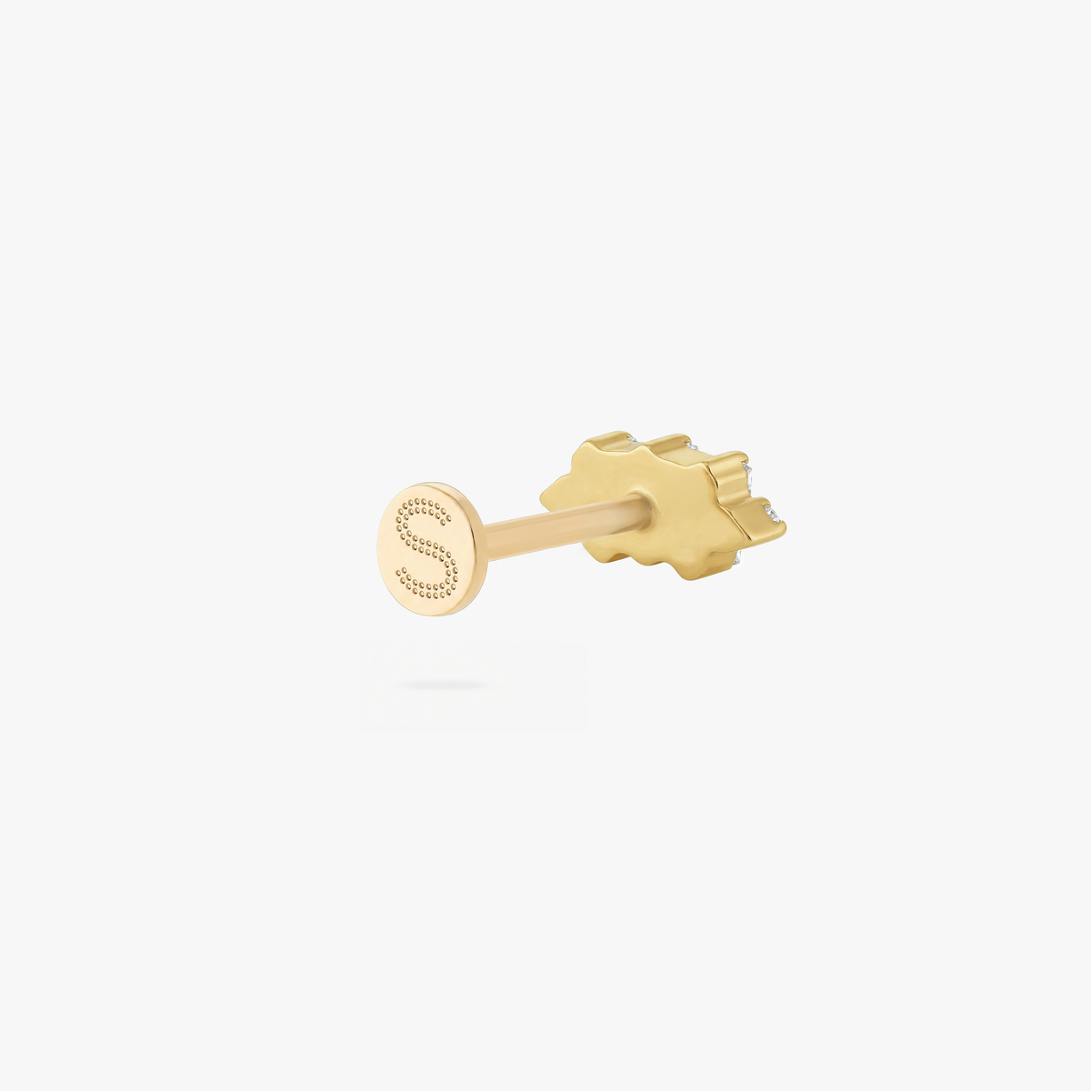 This is an image of a gold toned flatback stud which displays three clear, baguette cut CZ stones in a crown shape with two round, clear CZ stones on both ends of the crown. 