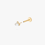 Open angle of a gold flatback stud with a small round and baguette stone