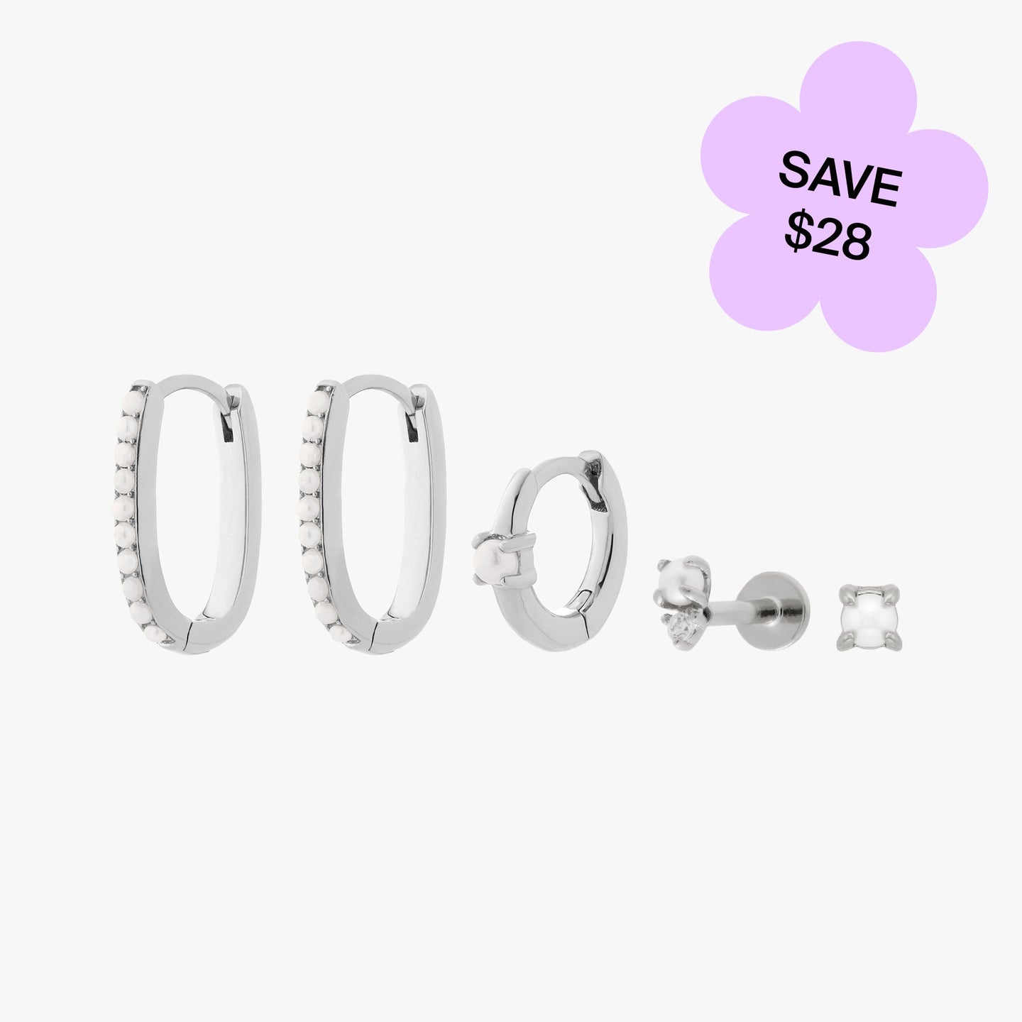 a set consisting of a pair of silver medium pearl oval hoops, a silver pearl helix huggie, a silver stacked cz pearl flatback stud, and a silver pearl stud color:null|silver