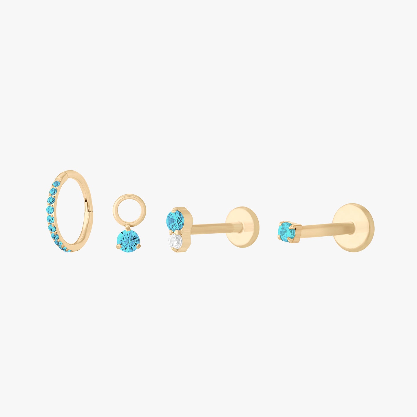 This is a set of earrings that are gold-toned with aquamarine stones. color:null|aquamarine