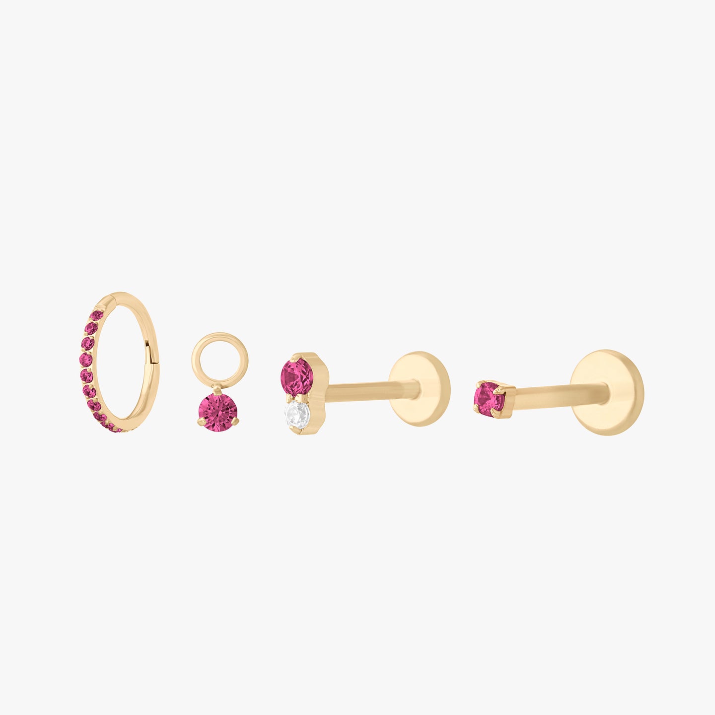 This is a set of earrings that are gold-toned with ruby stones. color:null|ruby