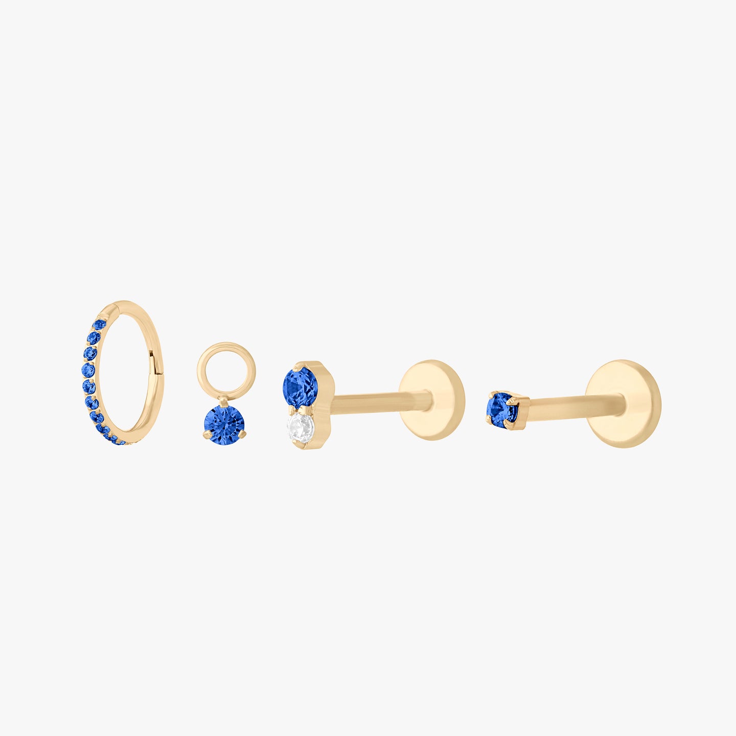 This is a set of earrings that are gold-toned with sapphire stones. color:null|sapphire