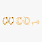 This Twinkle Starter Set has 2 chunky twinkle huggies, 2 mini pave huggies, and one micro twinkle flatback stud. These styles are all gold toned with clear CZ stone accents.