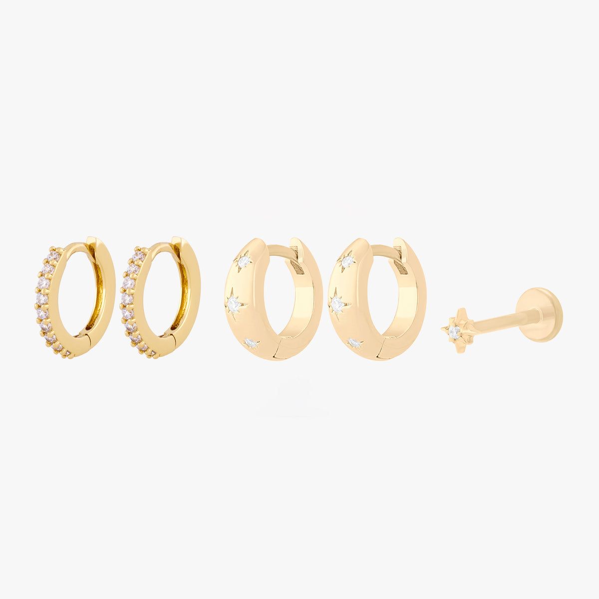 This Twinkle Starter Set has 2 chunky twinkle huggies, 2 mini pave huggies, and one micro twinkle flatback stud. These styles are all gold toned with clear CZ stone accents.