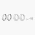 This Twinkle Starter Set has 2 chunky twinkle huggies, 2 mini pave huggies, and one micro twinkle flatback stud. These styles are all silver toned with clear CZ stone accents.